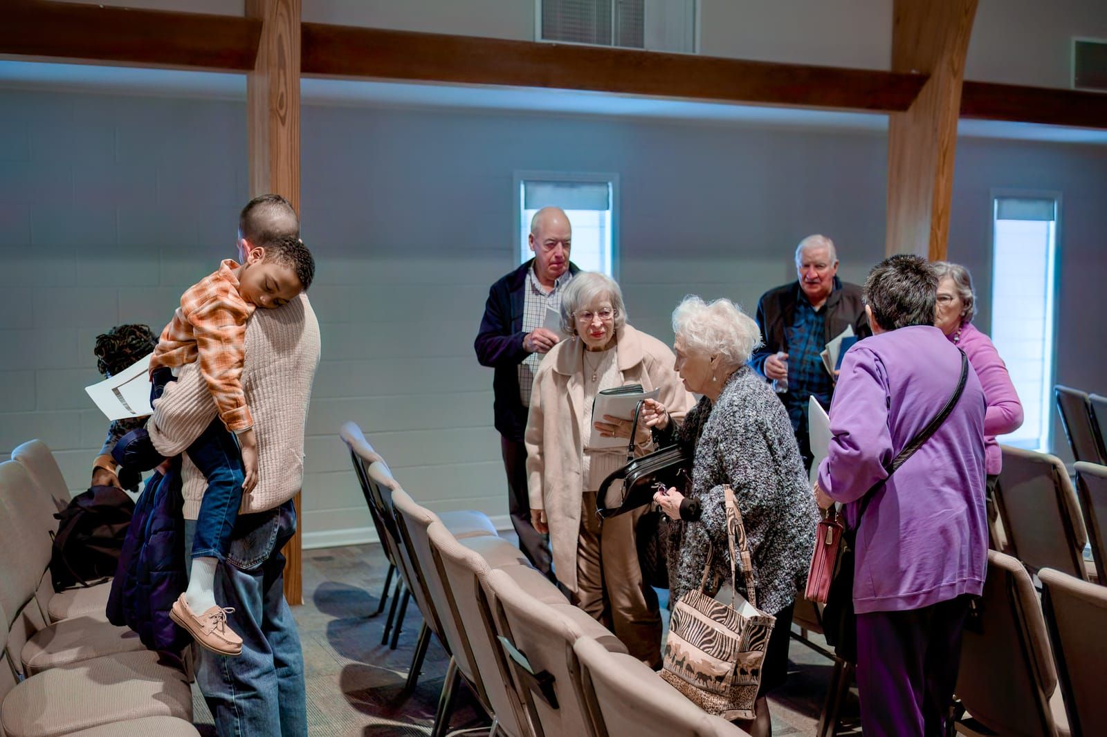 Members of the Lucy Baptist Church congregation greeting one another before the service.